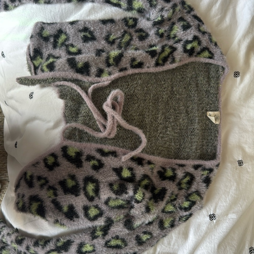 I am selling a fuzzy and warm cropped tie cardigan